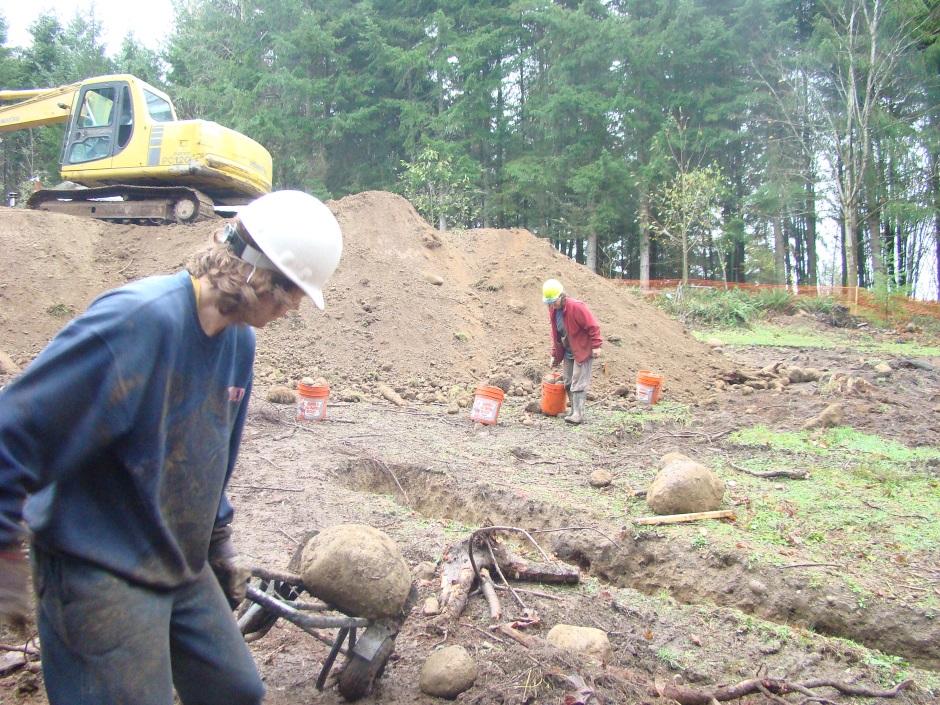 Excavator getting rocks