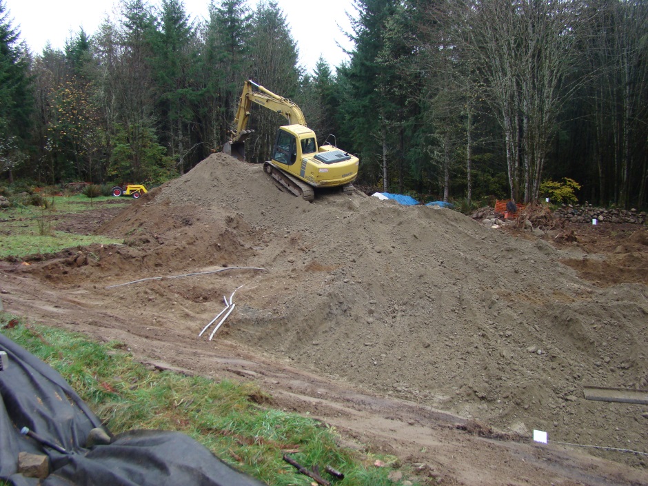 Excavator on mound Toku