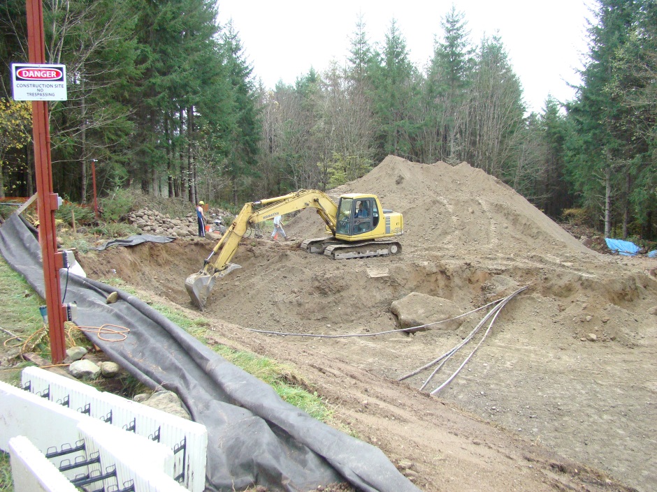 Excavator digging south east