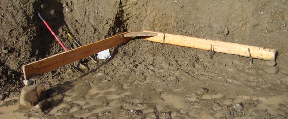 Batterboard set right height with rocks