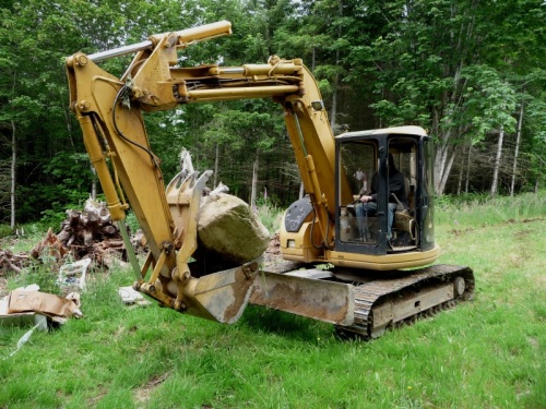 Digger big rock carrying