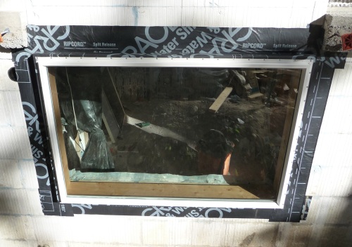 Downstairs wide window fitted outside