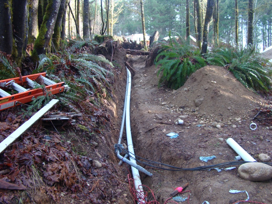 Drainage ditch showing electrical box