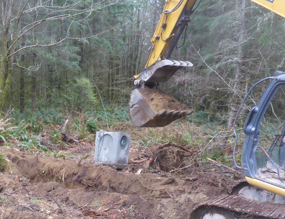 Excavator Digging Drainage Dispersal Trench