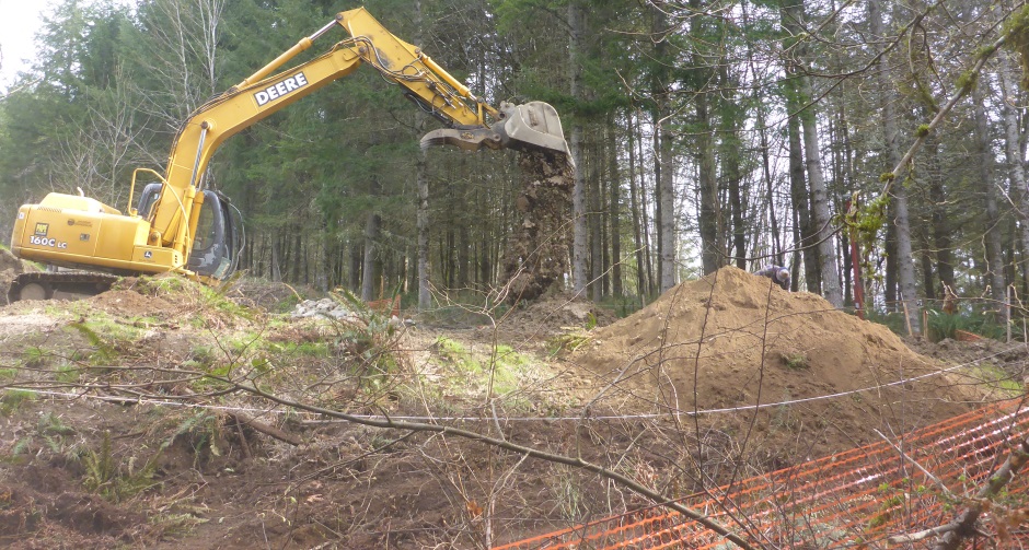 Excavator Making Level Lawn Area