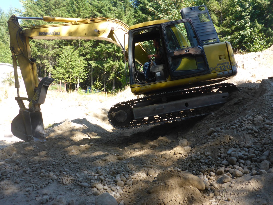 Footing Excavation Coming Down Dirt Mountain