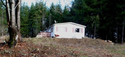 Manufactured home viewed from house site