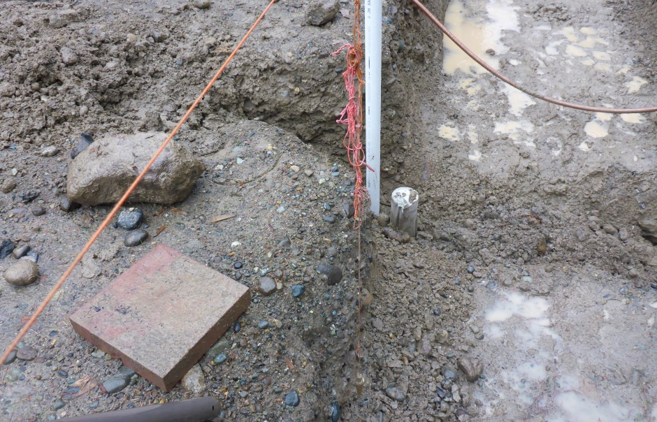 Plumb Bob Sets Footing Trench Edge