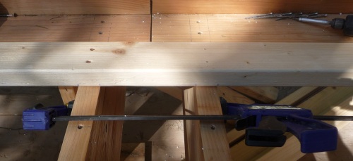 Roof beams pulled into alignment