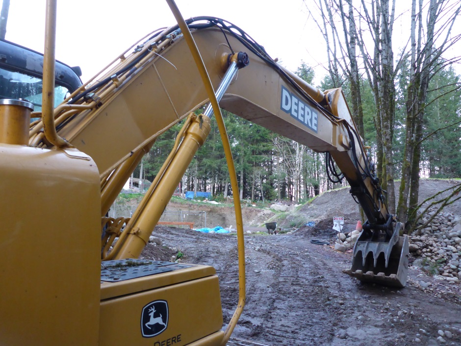 Site Under Excavator Arm