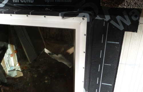 Window fitted using screws